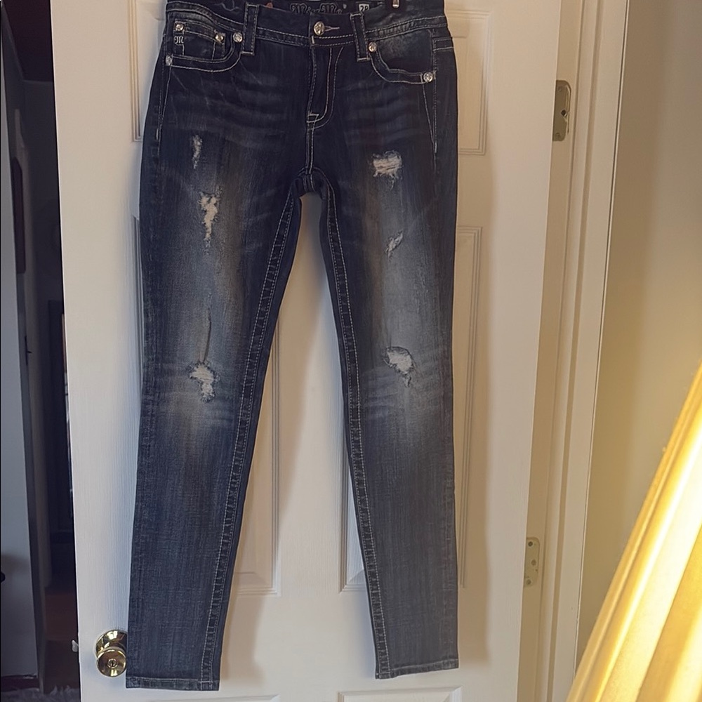Stylish Distressed mid rise dark blue skinny Miss Me embellished pocket jeans